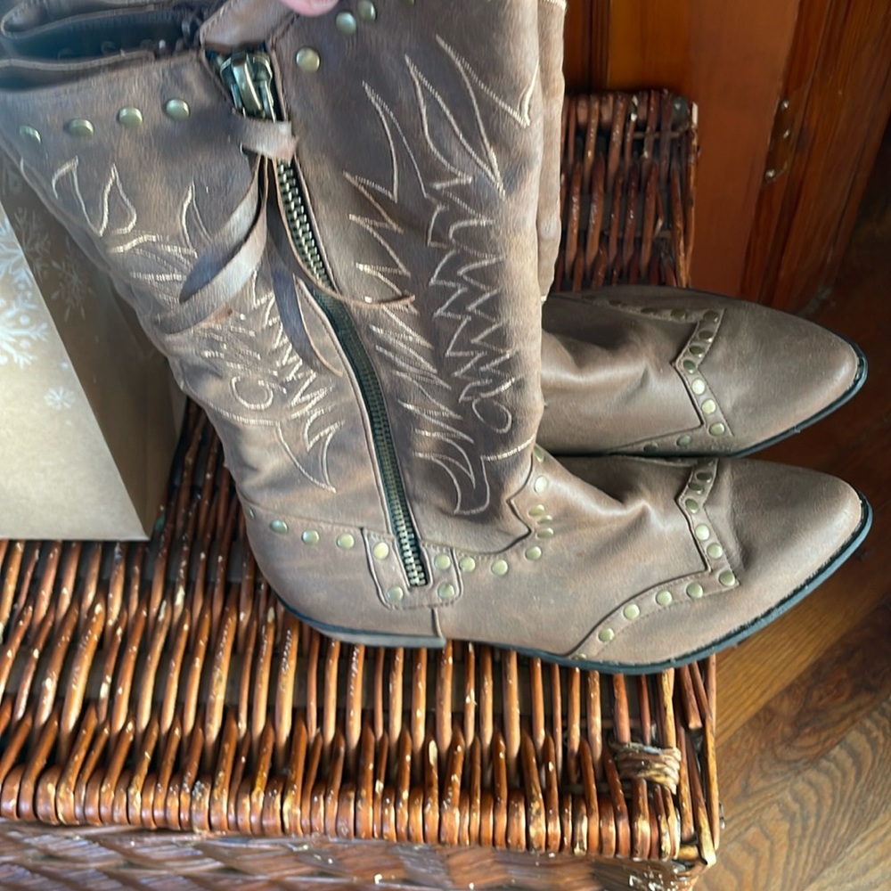 Pair of new leather coconut boots